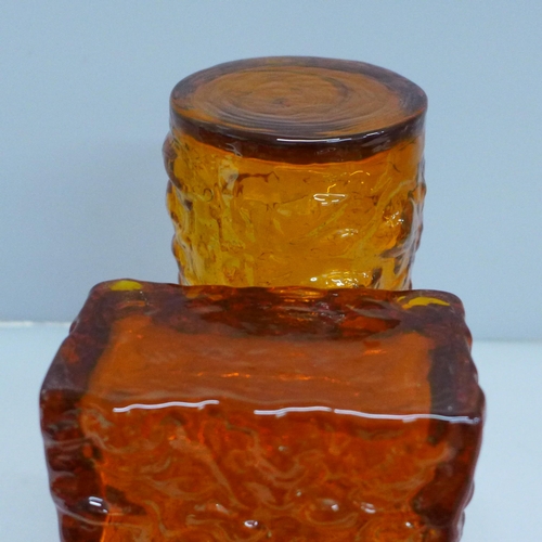 608 - Two tangerine orange glass vases, tallest 23cm