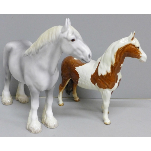 614 - A Beswick grey shire horse and a Pinto skewbald pony