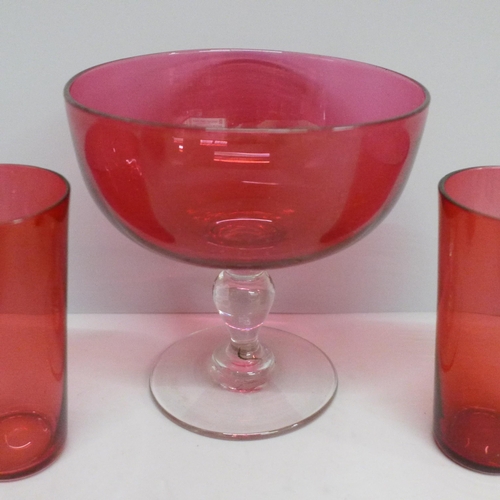 623 - Four items of cranberry glass