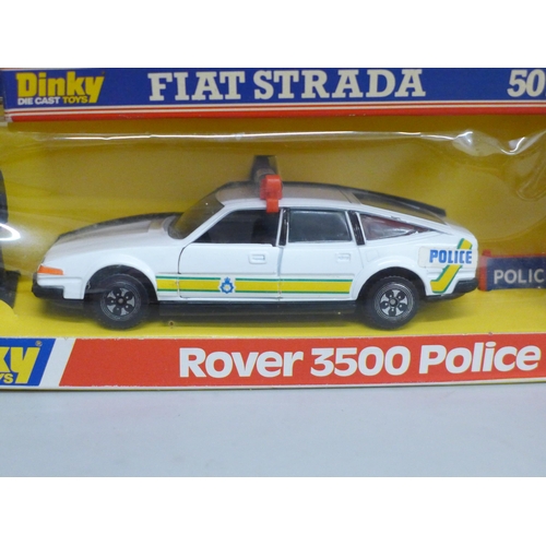633 - Four boxed model vehicles, Dinky 264 Rover 3500 Police car, 501 Fiat Strada and 667 Armoured Patrol ... 