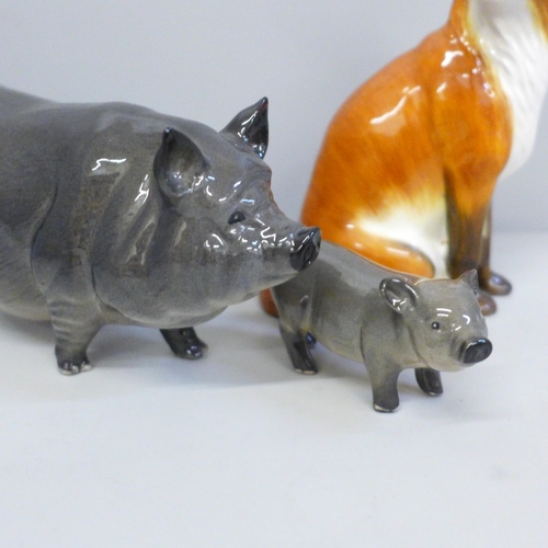 643 - A Beswick sow, piglet and fox