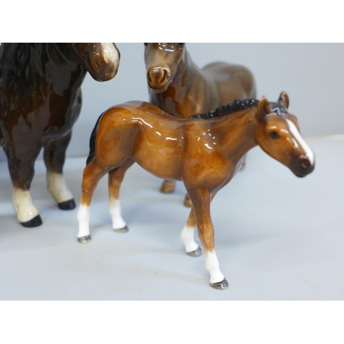 644 - Two Beswick ponies, foal and donkey