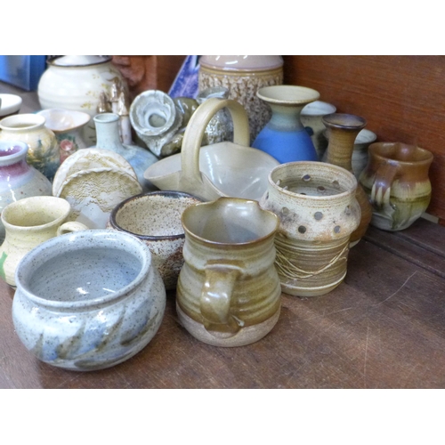 669 - A collection of signed studio pottery including Chris Aston, Stuart Macdonald, Southern Pottery, Hil... 