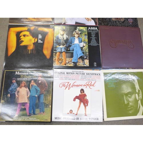 679 - Sixteen LP records, Kate Bush, Queen, Elton John, etc.