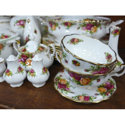 681 - A collection of Royal Albert Country Roses china and similar pattern china **PLEASE NOTE THIS LOT IS... 