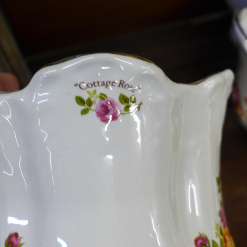 681 - A collection of Royal Albert Country Roses china and similar pattern china **PLEASE NOTE THIS LOT IS... 