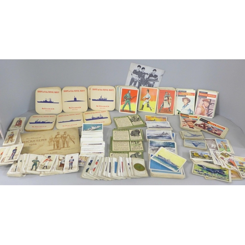 688 - A box of cigarette cards, other trade cards including A&BC Western cards, Tarzan & the She-Devil car... 