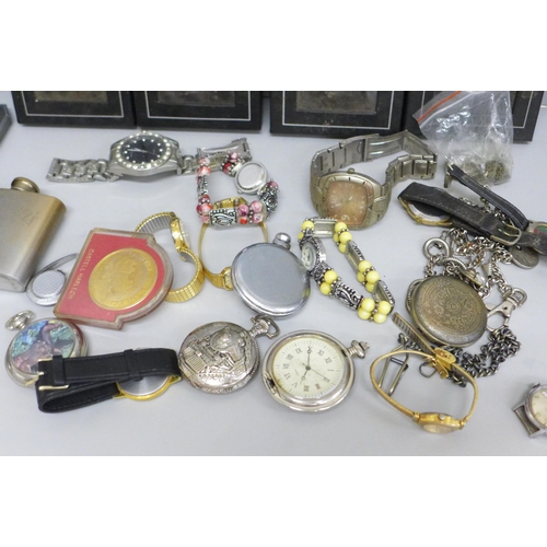 704 - A collection of watches, Eddie Stobart pocket watches, hip flask, etc.
