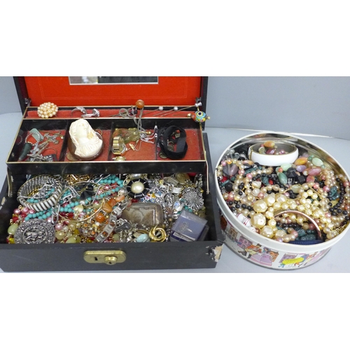 707 - A jewellery box and a tin of costume jewellery