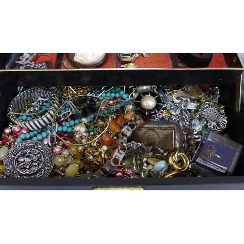 707 - A jewellery box and a tin of costume jewellery