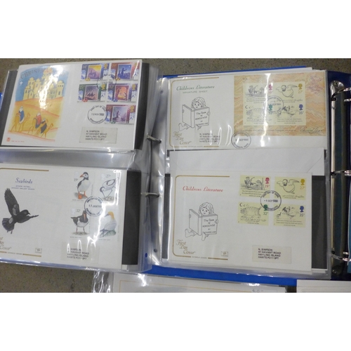 715 - A box of First Day Covers in albums and loose