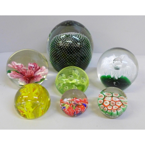 736 - Seven glass paperweights