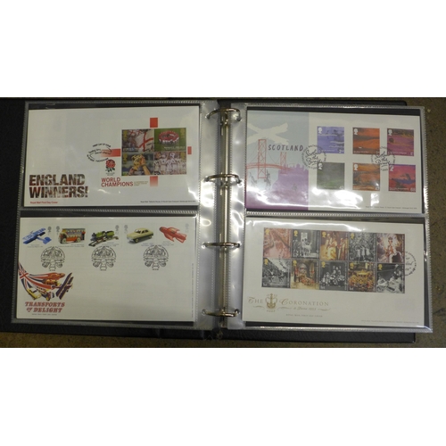 755 - An album of stamp First Day Covers, late 1990s to early 2000s