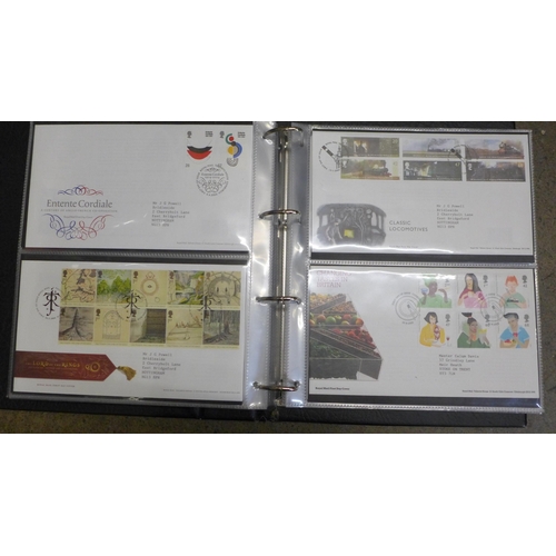 755 - An album of stamp First Day Covers, late 1990s to early 2000s