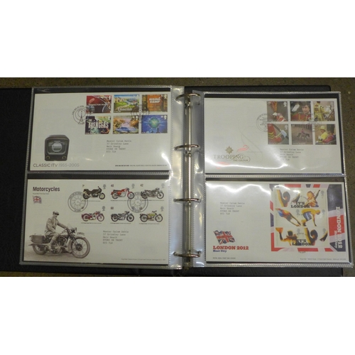 755 - An album of stamp First Day Covers, late 1990s to early 2000s