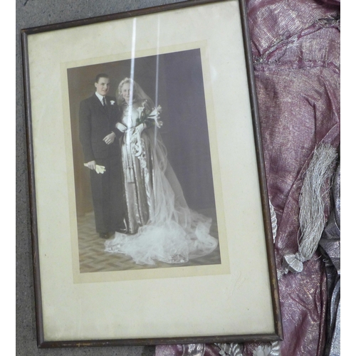 773 - A vintage wedding dress, veil and picture