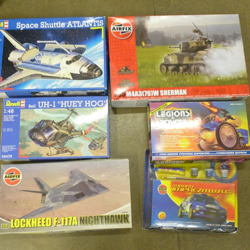 779 - Model kits including Revell Space Shuttle and three Airfix and a Legions of Power toy