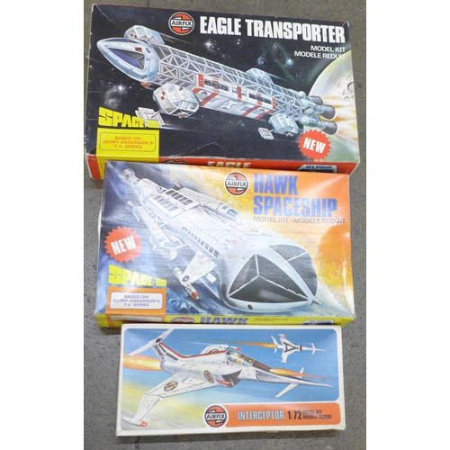 781 - An Airfix Eagle Transporter 06174-8 Series 6 kit, a Hawk Spaceship 05173-2 series 5 and an Intercept... 