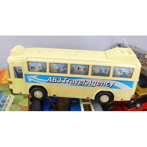 786 - Plastic buses and cars with wooden boats, some push and go **PLEASE NOTE THIS LOT IS NOT ELIGIBLE FO... 