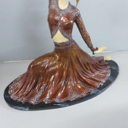 795 - A resin Art Deco style figure, 32cm