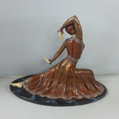 795 - A resin Art Deco style figure, 32cm