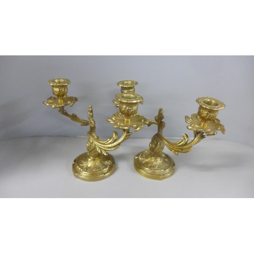 796 - A pair of gilt bronze two branch candlesticks, 17.5cm