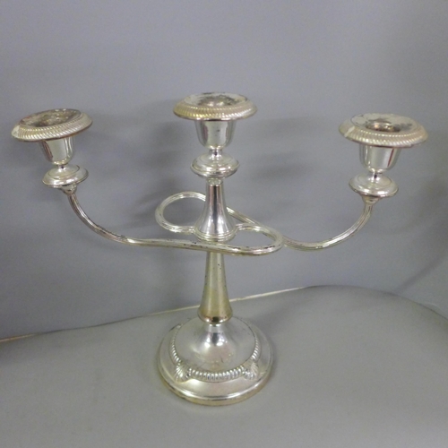 810 - A pair of Vera Wang candlesticks, boxes and a pair of plated candelabra