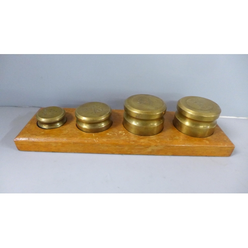 815 - A set of brass banker's scales and weights