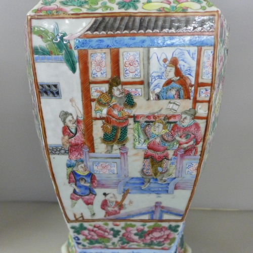 817 - A 19th Century Canton famille rose vase, crack to one panel, 59cm