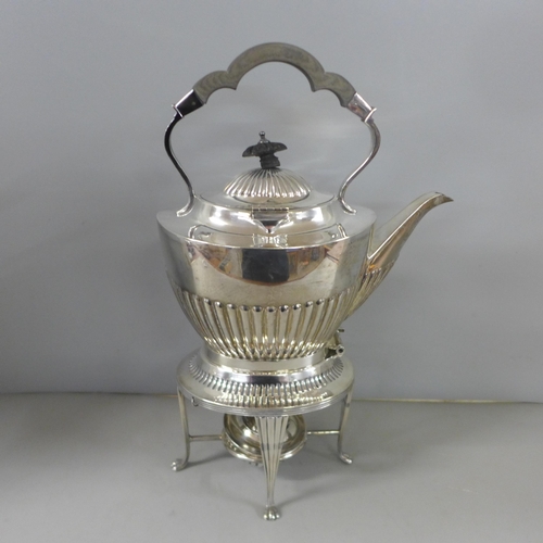 818 - A Mappin & Webb silver plated spirit kettle and stand with a silver burner