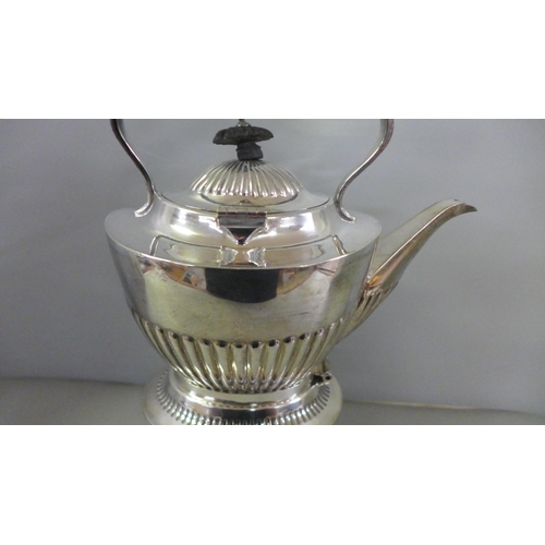 818 - A Mappin & Webb silver plated spirit kettle and stand with a silver burner