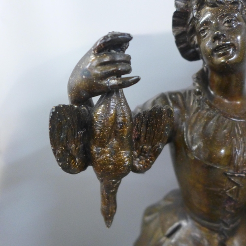 820 - A spelter figure, Marchande de Volailles and a figural Art Noveau style table lamp