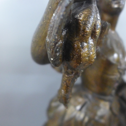 820 - A spelter figure, Marchande de Volailles and a figural Art Noveau style table lamp