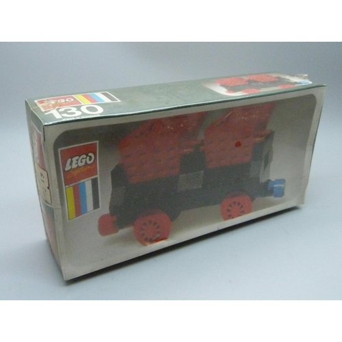 829 - Four early 1970s Lego kits, 312, 311, 130 and 134, still in original shrink wrap but with some split... 