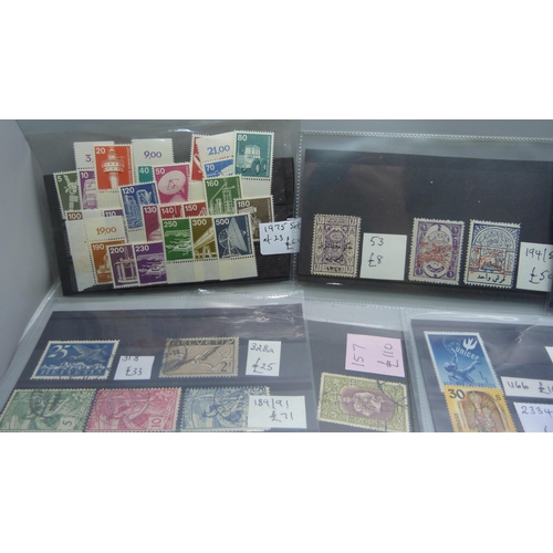 836 - World stamps on eighteen stock cards, (all identified and catalogued at over £2,000)