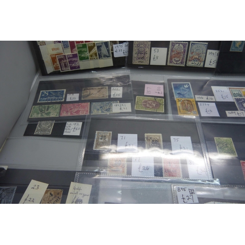 836 - World stamps on eighteen stock cards, (all identified and catalogued at over £2,000)