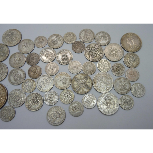 853 - A collection of 1920-1946 half silver coins, together with a silver 1887 half crown, total weight ap... 