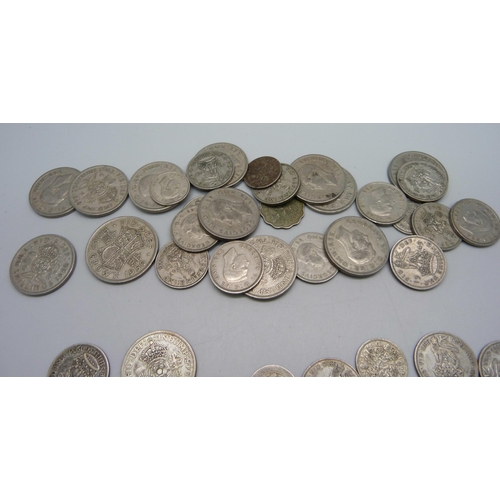 853 - A collection of 1920-1946 half silver coins, together with a silver 1887 half crown, total weight ap... 