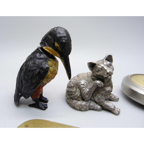 878 - A silver covered model cat, a nodding cold painted model bird, a fleam, watch keys, etc.