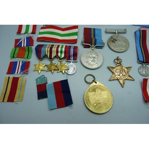 891 - A Zimbabwe Independence medal, other medals and ribbons