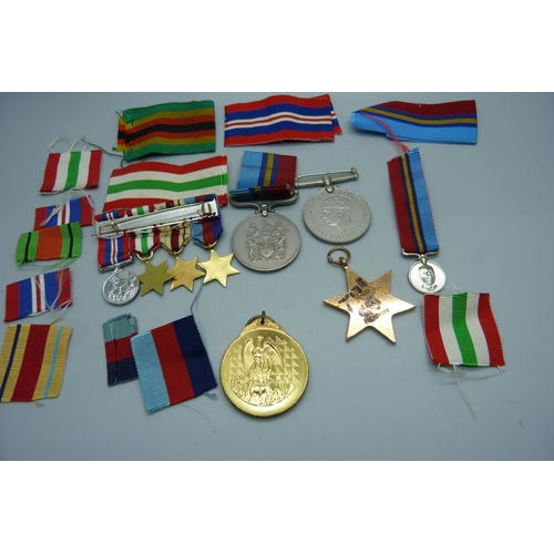 891 - A Zimbabwe Independence medal, other medals and ribbons