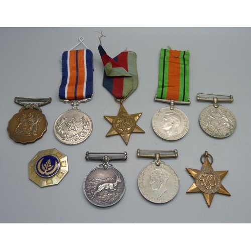 893 - An Africa Service Medal and two other medals to 59331 J.G. Geyser, two to 107884 H.R. Hughes and thr... 