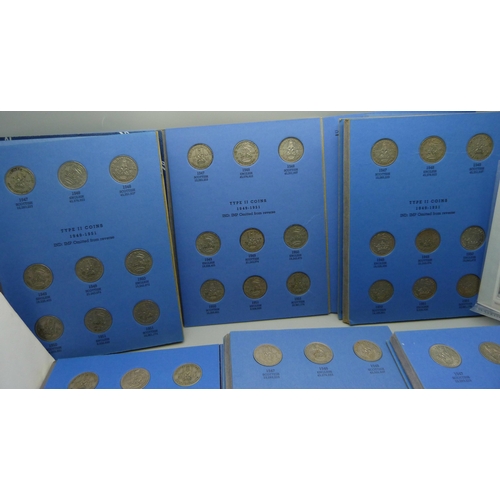 906 - Eight Whitman coin folders with seventy two non-silver shillings and a coinage of Great Britain and ... 