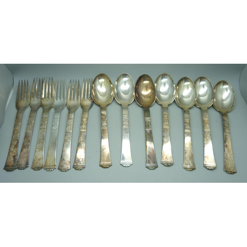 928 - A collection of Danish white metal cutlery, marked Absa, with crown and bishop