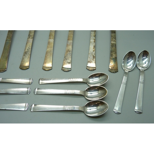 928 - A collection of Danish white metal cutlery, marked Absa, with crown and bishop