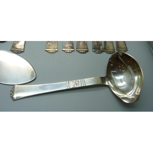 928 - A collection of Danish white metal cutlery, marked Absa, with crown and bishop