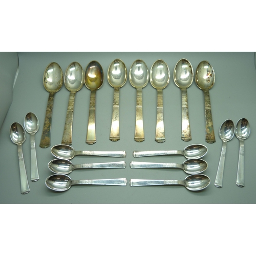 928 - A collection of Danish white metal cutlery, marked Absa, with crown and bishop