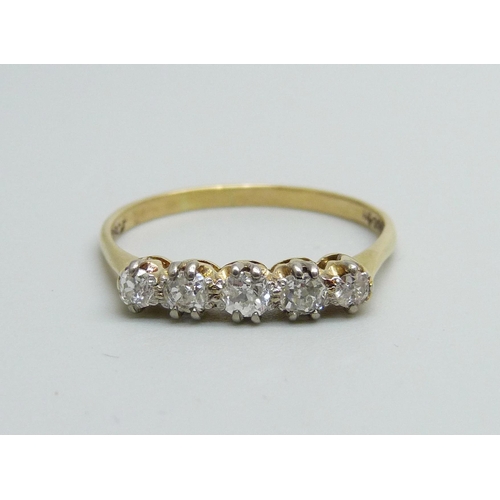 947 - An 18ct gold five stone diamond ring, 2.7g, U