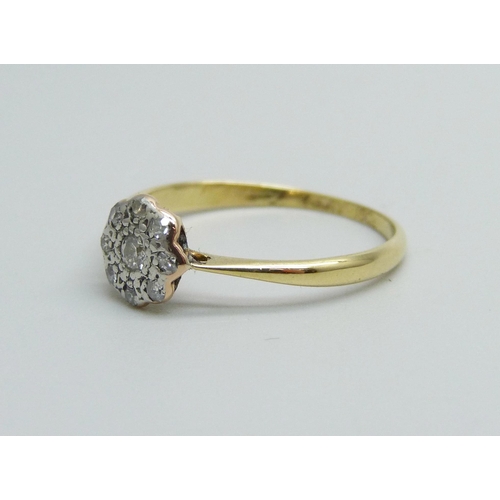 949 - An 18ct gold and platinum diamond daisy cluster ring, 1.6g, O