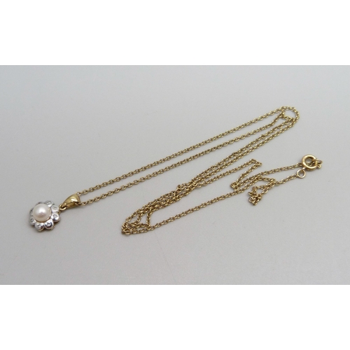 959 - A 9ct gold diamond and pearl pendant on a 9ct gold chain, 3.3g, chain 50cm